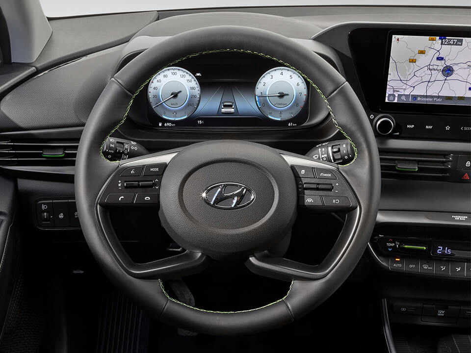 Close-up of the all-new Hyundai i20 steering wheel and 10.25" touchscreen